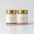Two NIGEO cream deodorant jars side by side, Oud and Musc